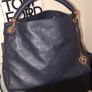 Louis Vuitton
Navy Monogram Empreinte Artsy MM Gold Hardware, 2019